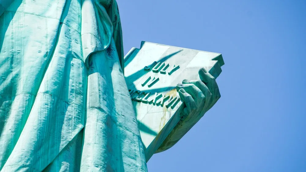 pic of Book in the hand of statue of Liberty