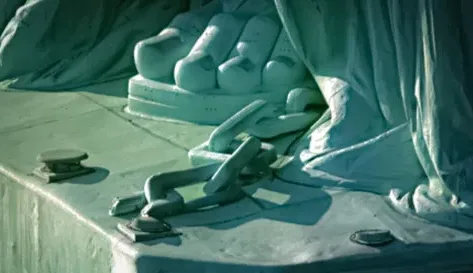 pic of broken Chains in feet of Statue of Liberty
