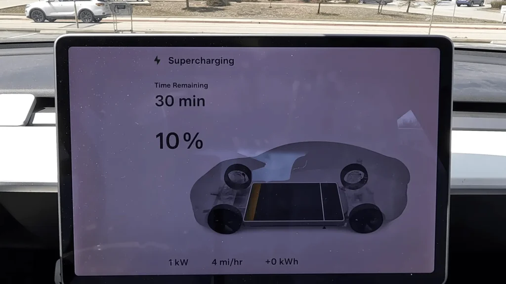 Tesla Magic Dock Locations Explained: A Guide for Non-Tesla Drivers 5 Pic of Charging Screen of EV during chagrin at Tesla Magic Dock Locations