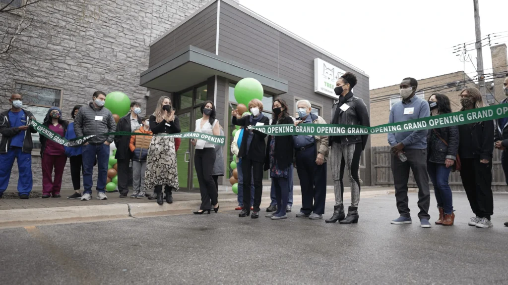 Tree House Humane Society - A Loving Home for Every Cat 7 image of cutting ribbon at Tree House Society Veterinary Wellness Center Grand Opening