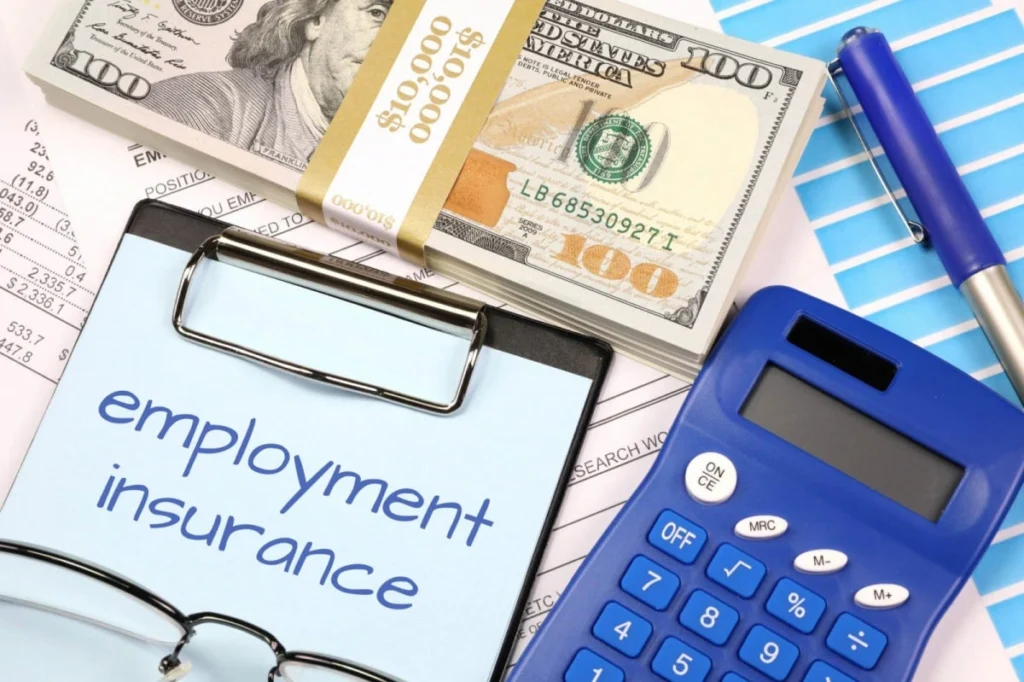 Employment Insurance: A Comprehensive Guide to Benefits and Challenges 1 image of dollars, calculator paper, employment-insurance