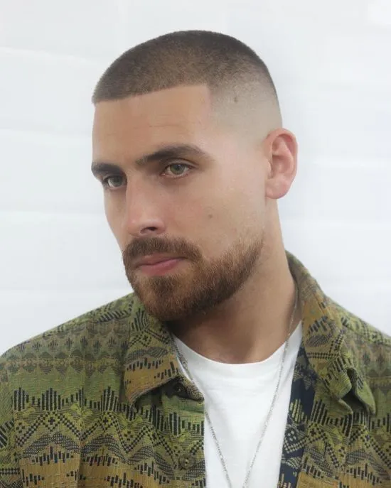 Best Bald Haircut Styles: The Ultimate Guide (with Images) 2025 4 image of Buzz Cut with a Bald Fade