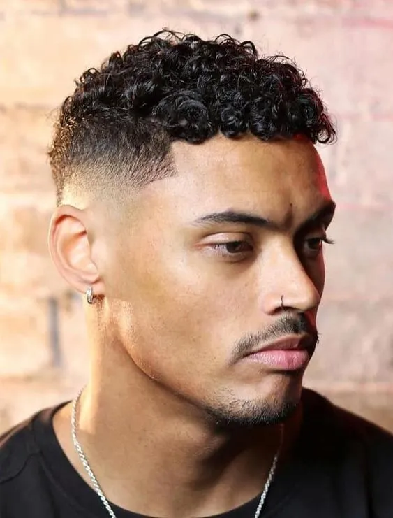 Best Boosie Fade Haircuts for Men: A Step-by-Step Guide 7 image of Curly Top Boosie Fade
