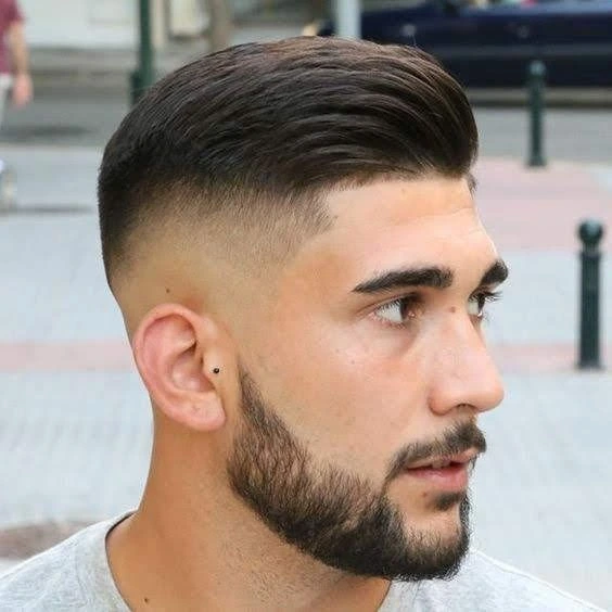 High Taper Fade Haircuts for Men: Styles & Inspiration 9 High Taper Fade with a Hard Part image, high taper haircut
