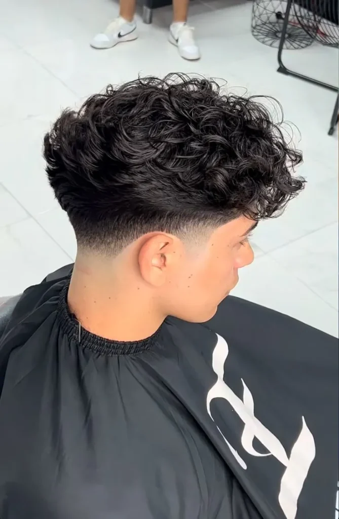 Men's Fluffy Edgar Haircut: Styles & Trends A Step-by-Step Guide 2 image of Taper fade haircut fluffy Edgar cut hairstyle teenage men