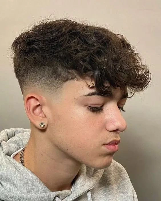 Best Mid Taper Fade Styles for Men: Short, Medium & Long Hair 5 image of Textured Mid Taper Haircut, mid taper haircut