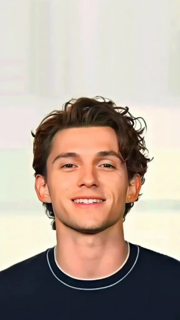 Best Tom Holland Haircut Styles:A Step-by-Step Guide 3 image of Tom Holland's New Haircut (Messy Waves)