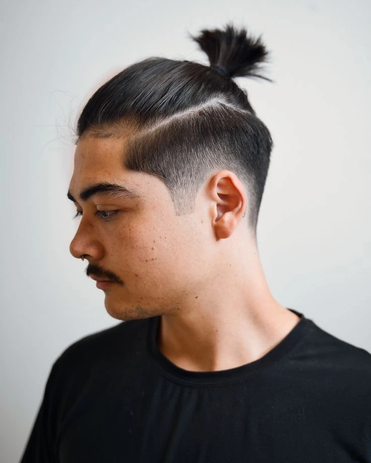 Undercut Low Fade Haircut: A Comprehensive Guide for Men 4 image of Undercut Low Fade Haircut with Long Hair