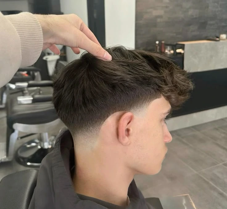 Undercut Low Fade Haircut: A Comprehensive Guide for Men 2 image of undercut low fade haircut