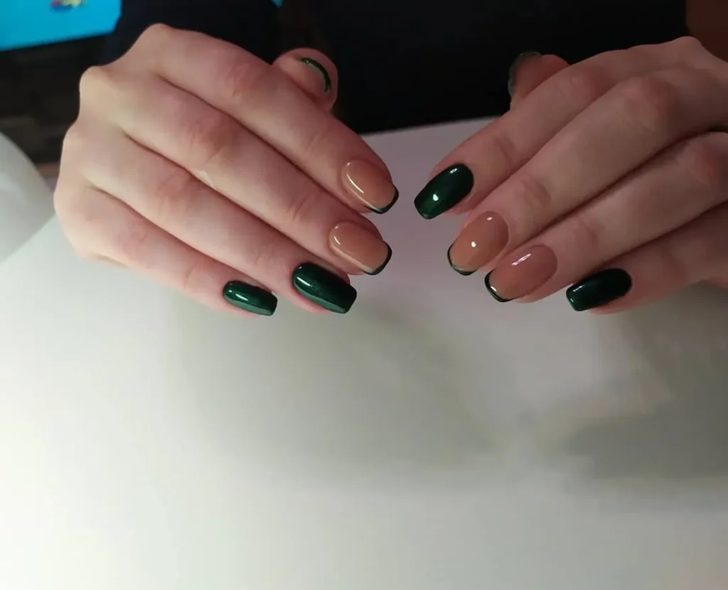 Green Nail Designs: 2026 Sage & Emerald Trends 12 Sage green base nails with white and gold polka dots, retro modern spring aesthetic Fiorucci Nina Ricci runway inspired